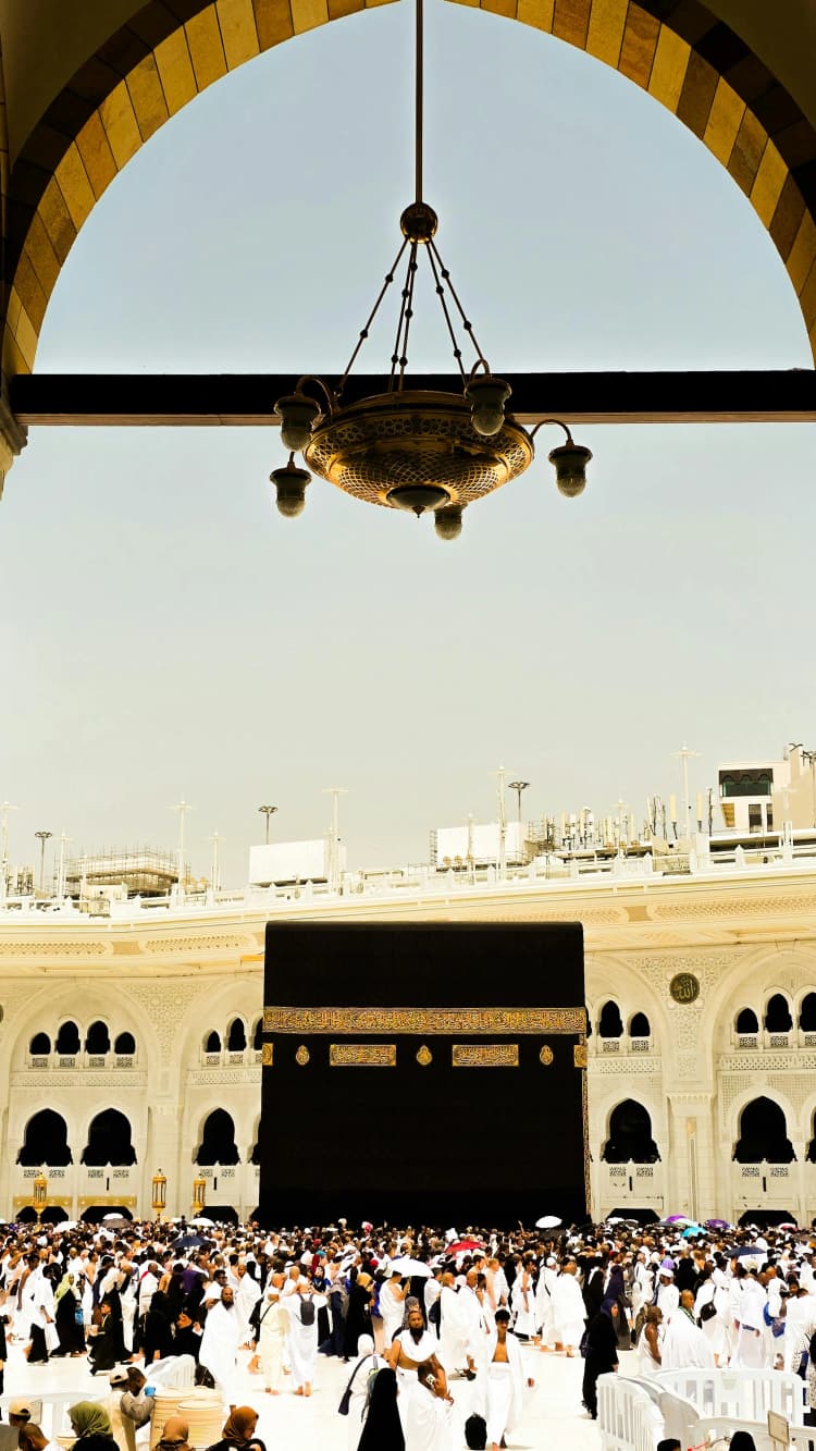 The Kaaba in Mecca surrounded by pilgrims during Hajj