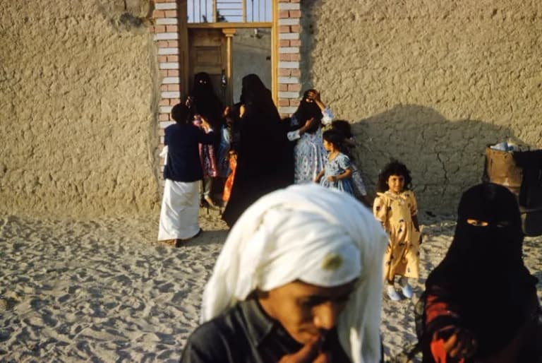 Family in traditional attire in Saudi Arabia