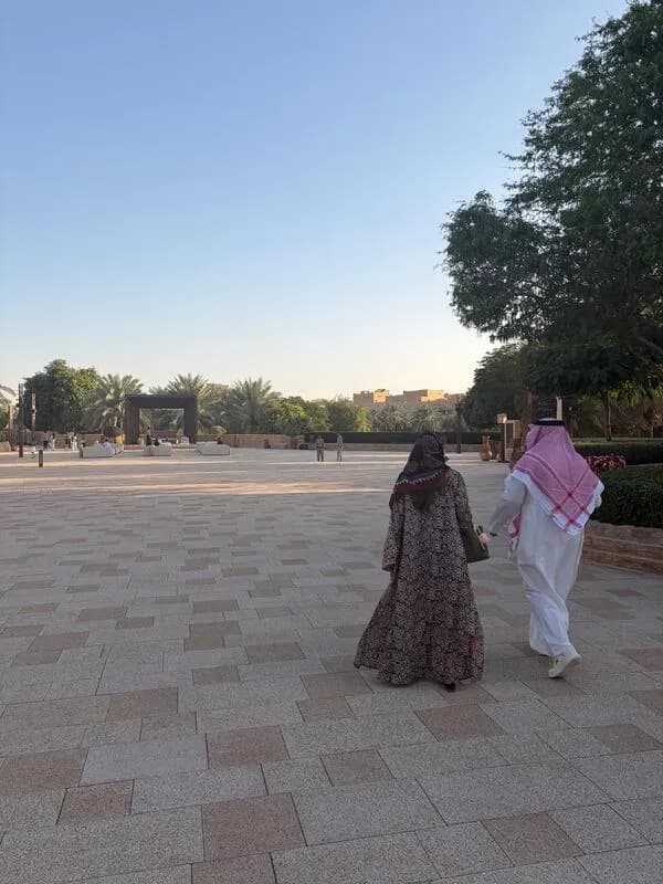 Saudi couple walking in Riyadh park